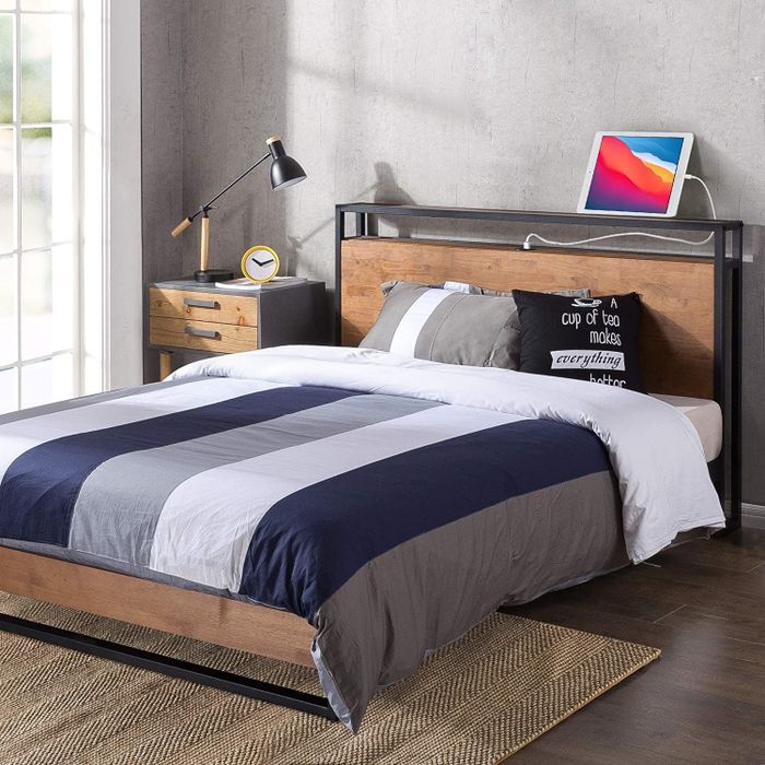 The chestnut brown ZINUS Solid Wood Platform Bed with shelf with USB ports