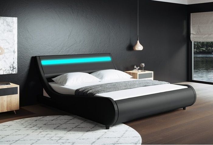 The black Aaina Upholstered Low Profile Platform Bed