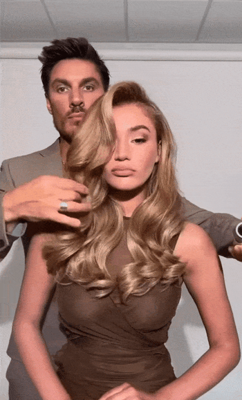 GIF of Chris Appleton styling a model's hair with hairspray