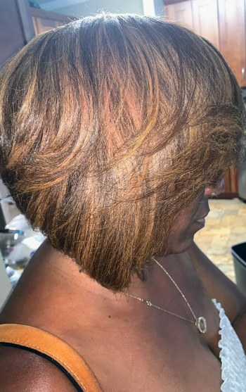 Reviewer's silky, vibrant hair after using the Olaplex treatment