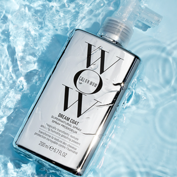 The silver bottle of the treatment submerged in water