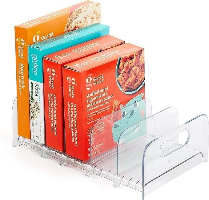 Acrylic organizer holding various frozen food boxes for neat and efficient storage