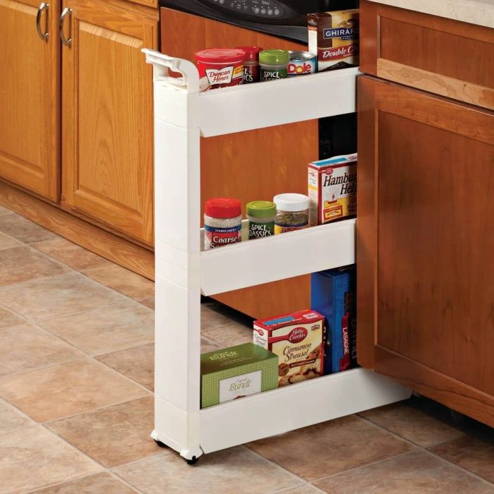 A three-tier rolling cart that's slim enough to slide between an oven and kitchen cabinet.