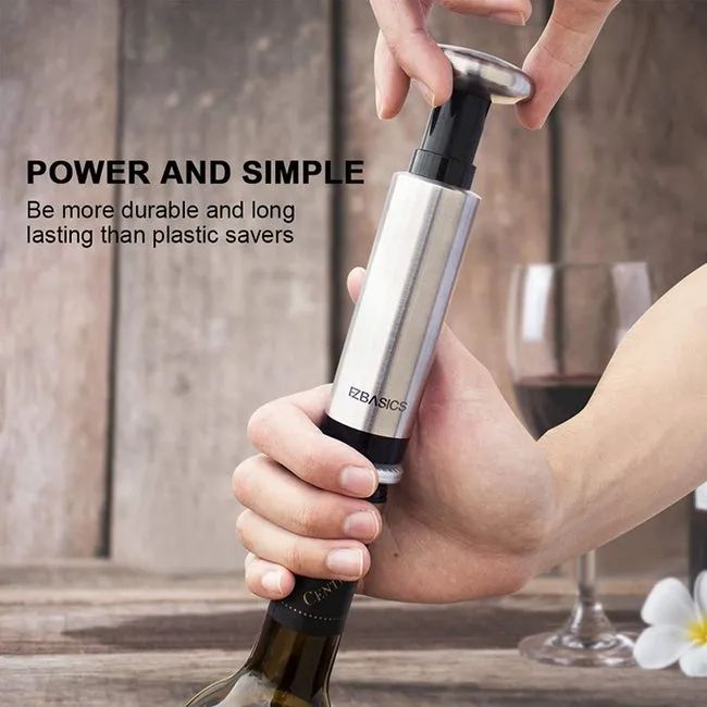 A person using a stopper to seal a bottle of wine