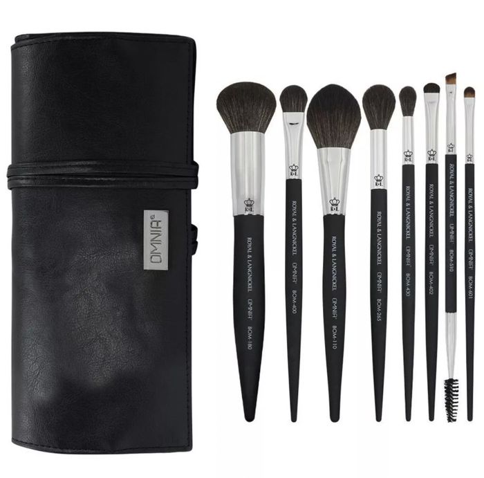 A set of brushes with a convenient wrap case for easy storage.
