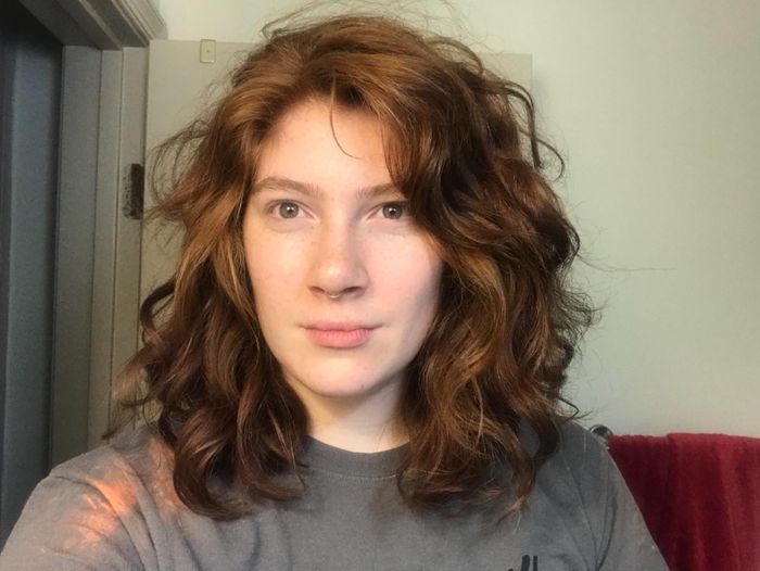 After using the OGX air-dry cream, the reviewer’s hair appeared tousled, smooth, and full of volume.