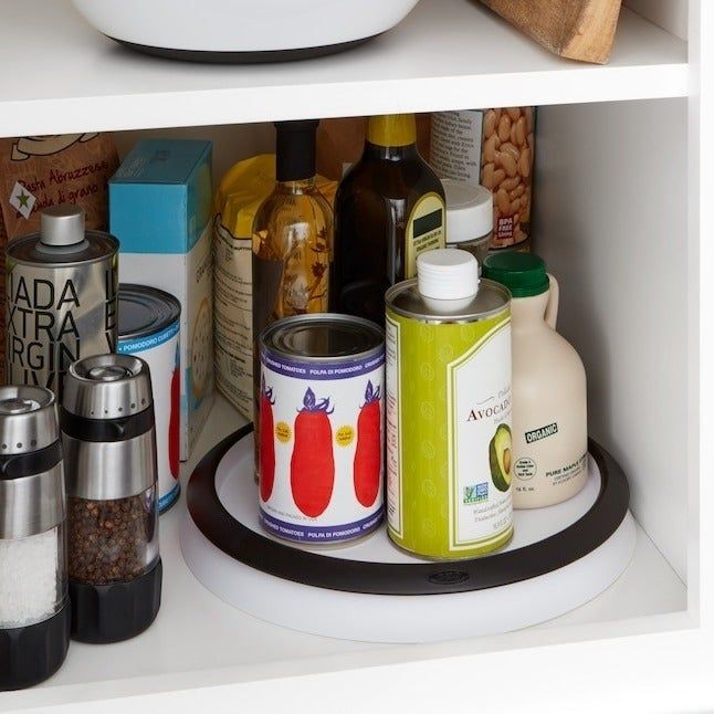 A lazy Susan stored in a cabinet
