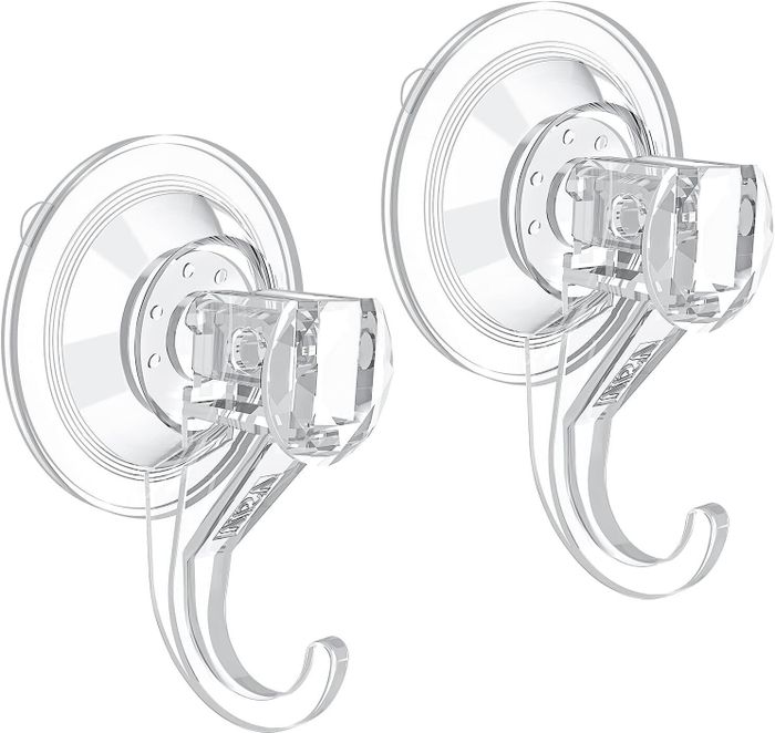 Two transparent suction cup hooks