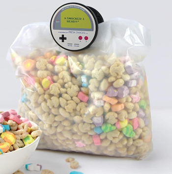 A Gameboy-themed chip clip on a cereal bag