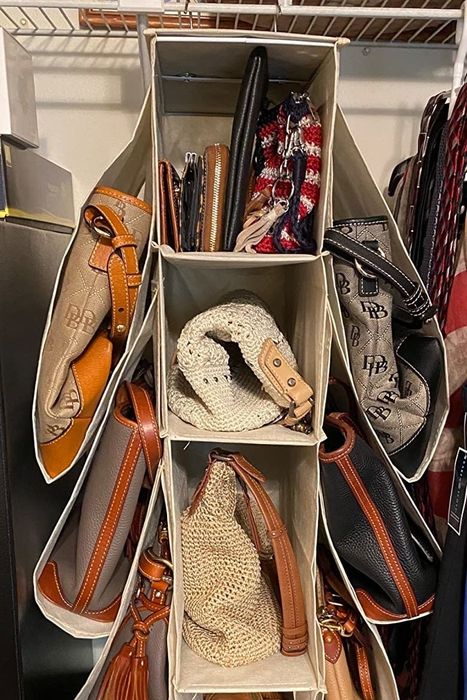 Another review photo showcasing the bag organizer in a closet, demonstrating its effectiveness in organizing bags.
