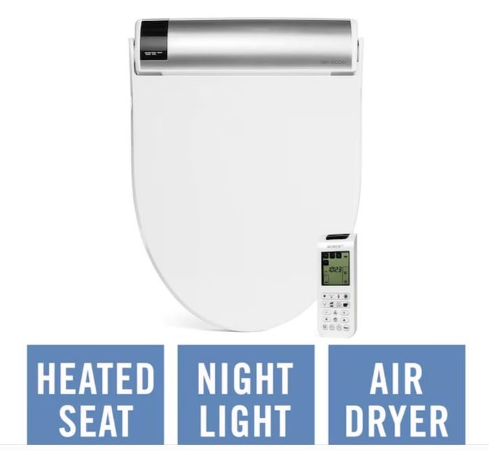 An electronic bidet with remote control that includes a heated seat, night light, and air dryer, set against a white backdrop.