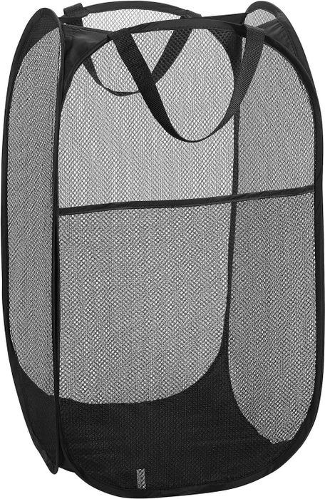 A black mesh laundry hamper that can be collapsed for easy storage