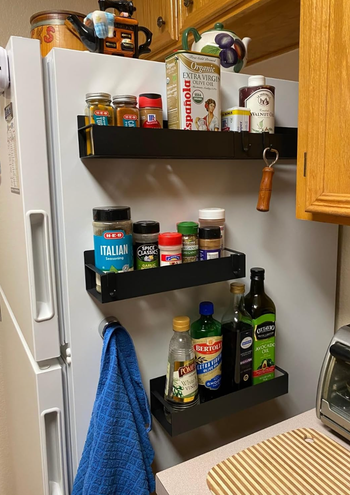 The black version magnetized to a fridge