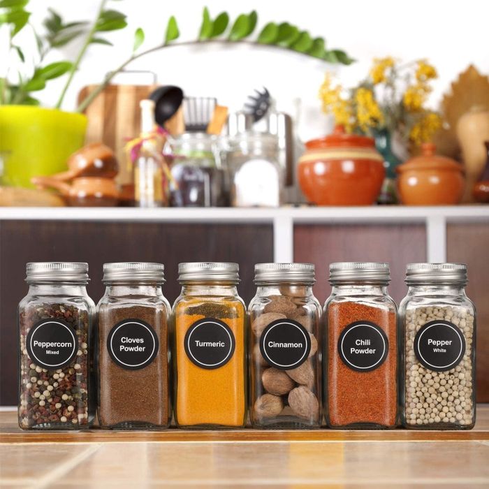 The spice jars with their labels clearly visible