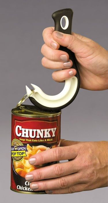 A reviewer using a hook-shaped tool to open a can with a ring tab