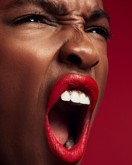 A model showcasing the lip stain.
