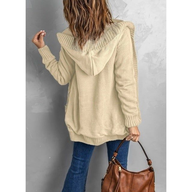 A view of the sweater with a hood from the back, highlighting its cozy design.
