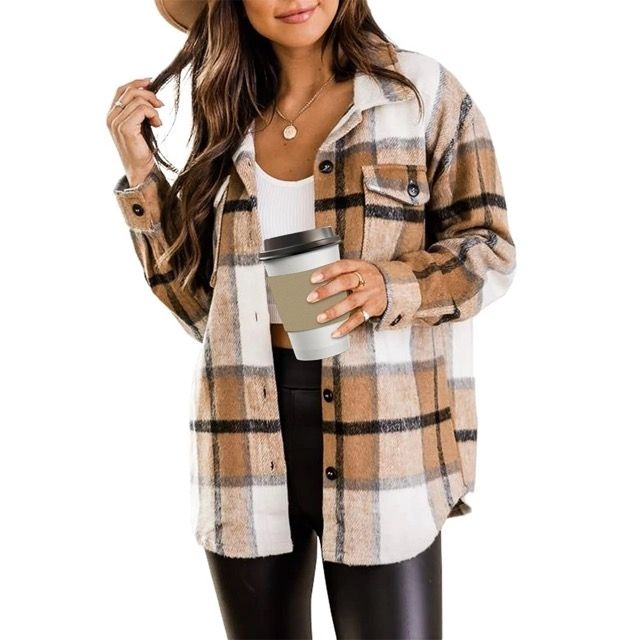 A model is wearing the shirt jacket in a classic khaki color, adding a cozy, laid-back vibe.