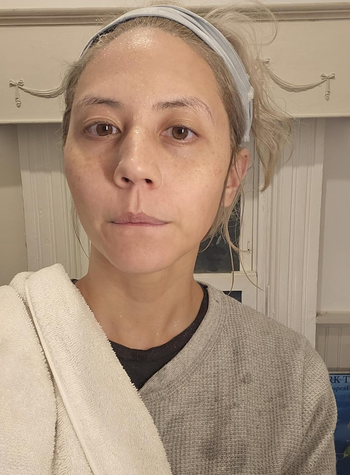 The reviewer after using the mask, with glowing and refreshed skin.