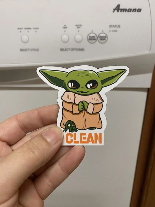 A Baby Yoda magnet displaying the word 'clean.'