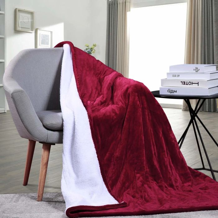 A red blanket casually draped over a chair, adding a pop of color to the room.