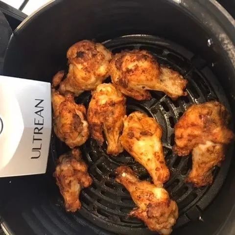 Chicken wings cooked in the air fryer come out crispy and delicious with minimal effort.
