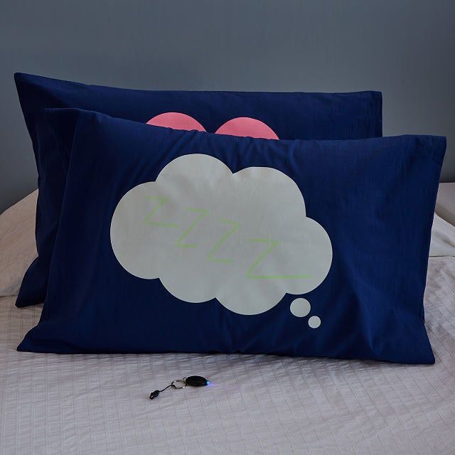 The doodle pillowcase featuring cloud and heart designs.
