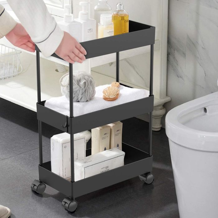 The cart filled with various bathroom essentials