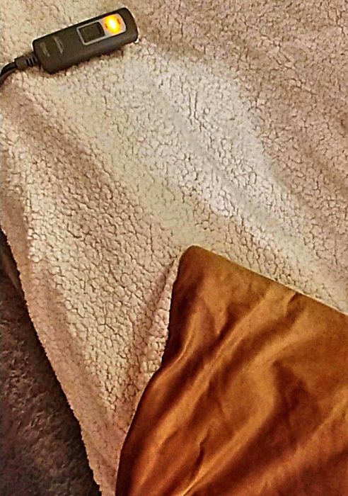 A reviewer image of a blanket in a certain color