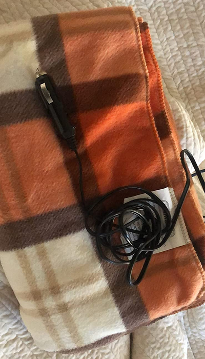 A reviewer image showing an orange blanket