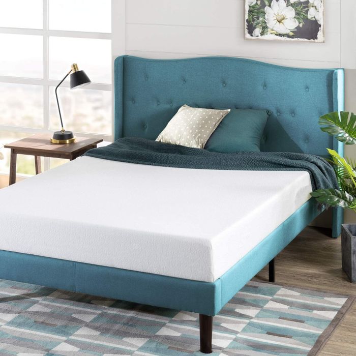 A mattress placed on a bed.