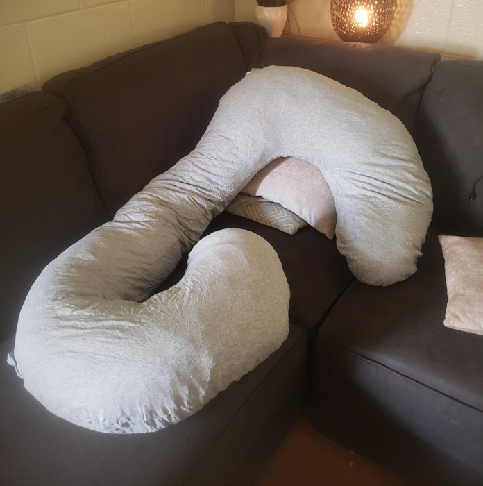 The reviewer has posted an image featuring a light gray pillow.