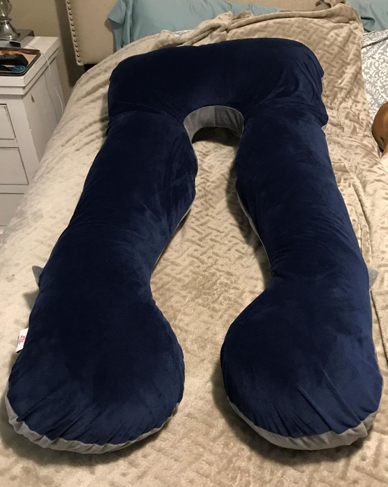 Reviewer image featuring the navy and gray pillow combination