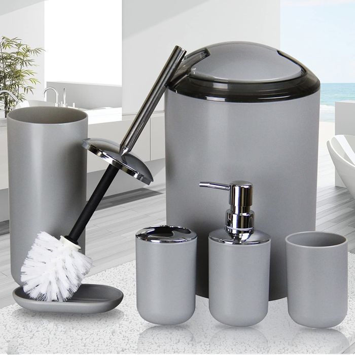 This set features a trash can, soap dispenser, soap dish, toilet brush, toothbrush holder, and a toothbrush cup, all in a lovely apricot hue.
