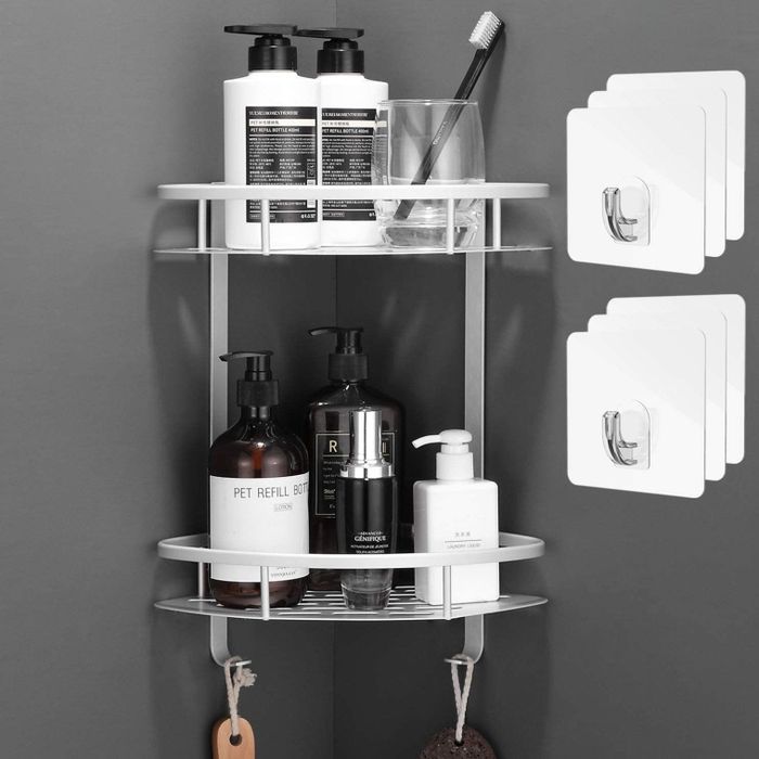 The shower caddy neatly holding various shower products.