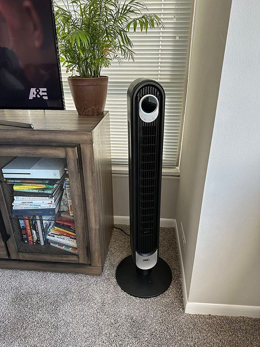 The black oscillating tower fan