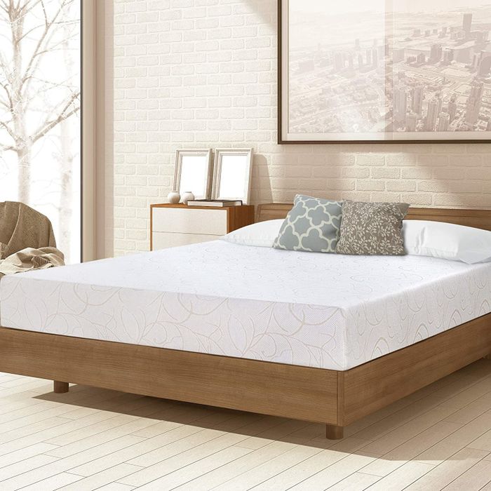 A mattress placed on a bed.