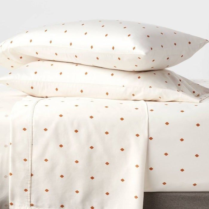 a bedding set featuring a delicate diamond print
