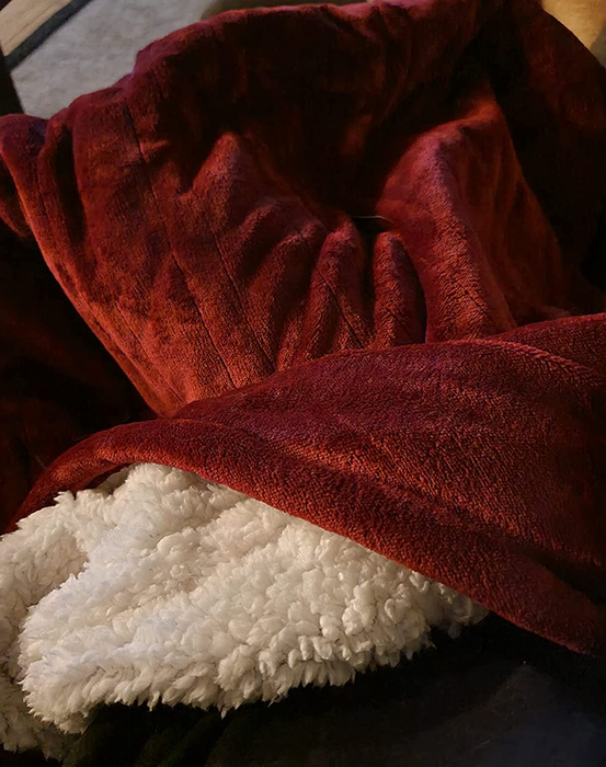 A reviewer image showcasing a red blanket