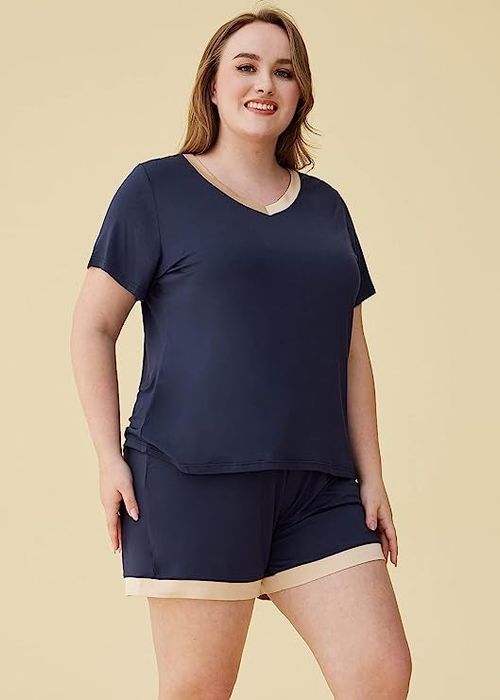 Model wearing the navy blue pajamas