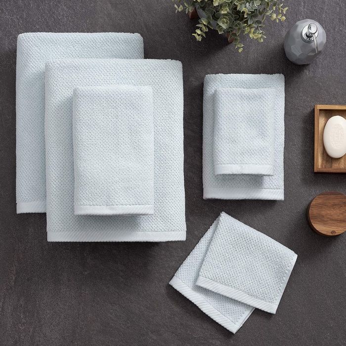 Towels in a calming sky blue shade for a refreshing touch in your bathroom.