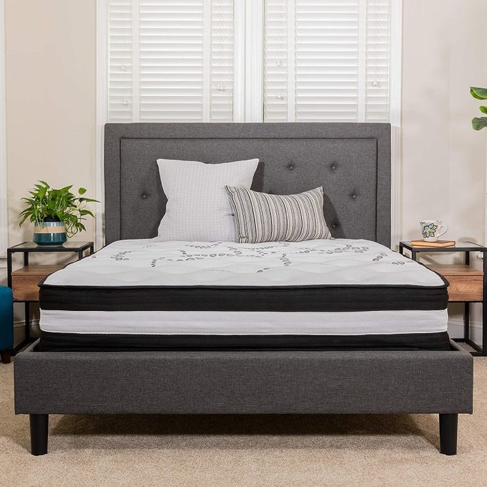 The mattress placed neatly on a bed.