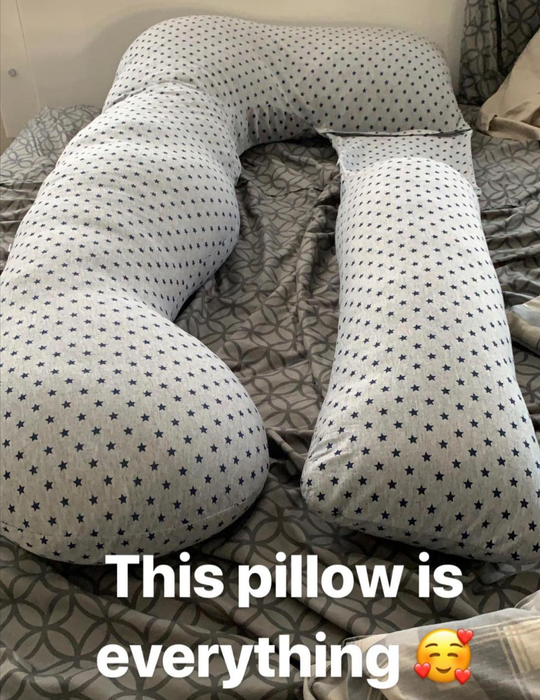 Reviewer image showcasing the pillow with the text that reads,
