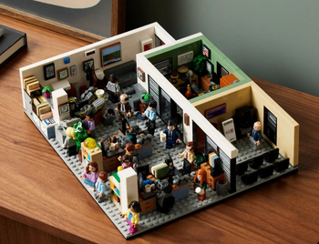 A complete Lego set representing the entire cast of The Office, complete with miniature furniture and characters.