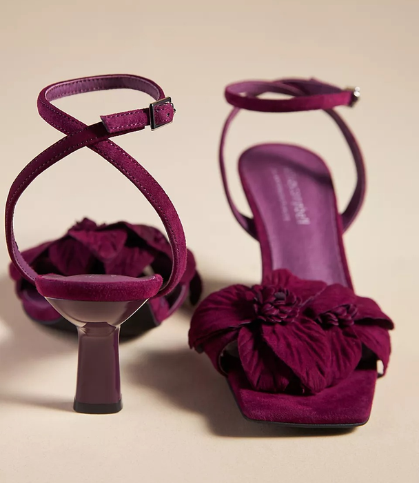 The shoes in a rich burgundy shade.