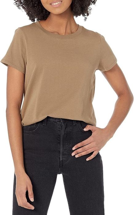another model wearing the shirt in a warm brown shade