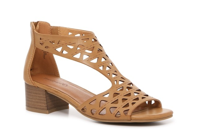 A cutout block heel sandal in light brown.