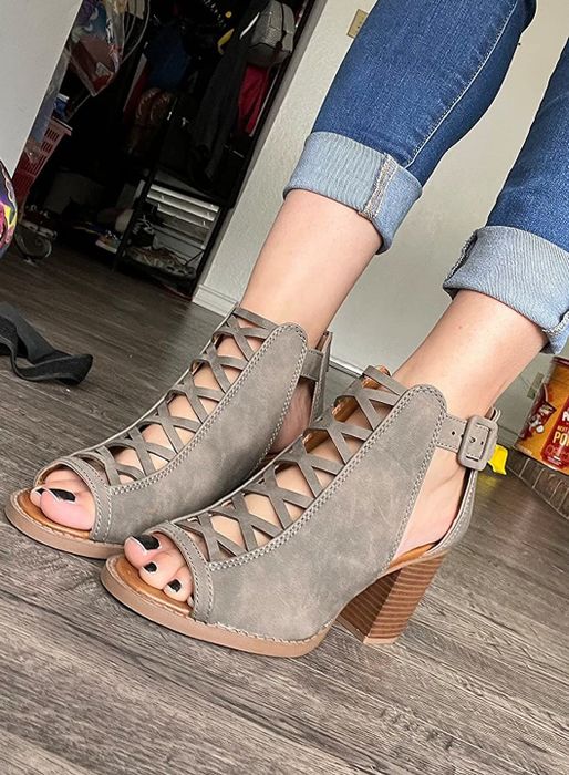 A reviewer is wearing the grey heels.