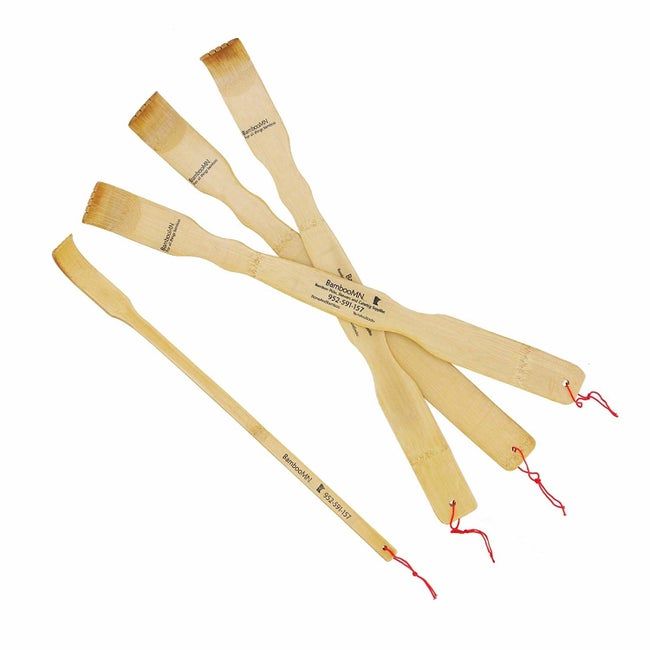 A set of four bamboo back scratchers
