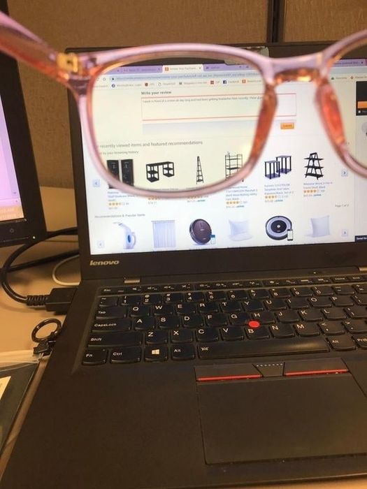 A reviewer photo showing the view of a laptop screen through the blue light-blocking glasses.
